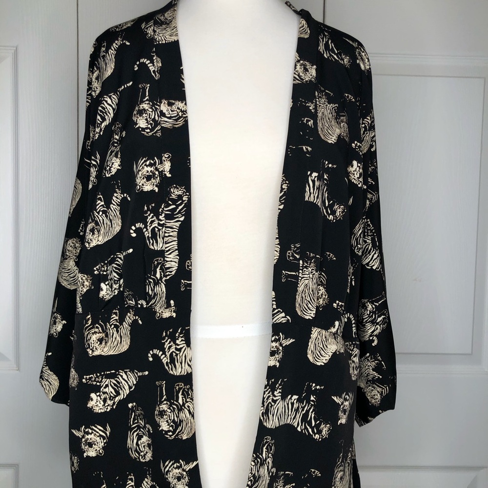 Kimono with repeat tiger design.